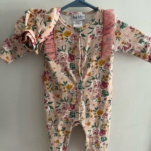 Nicole Miller one piece floral bodysuit with ruffle and matching hat.